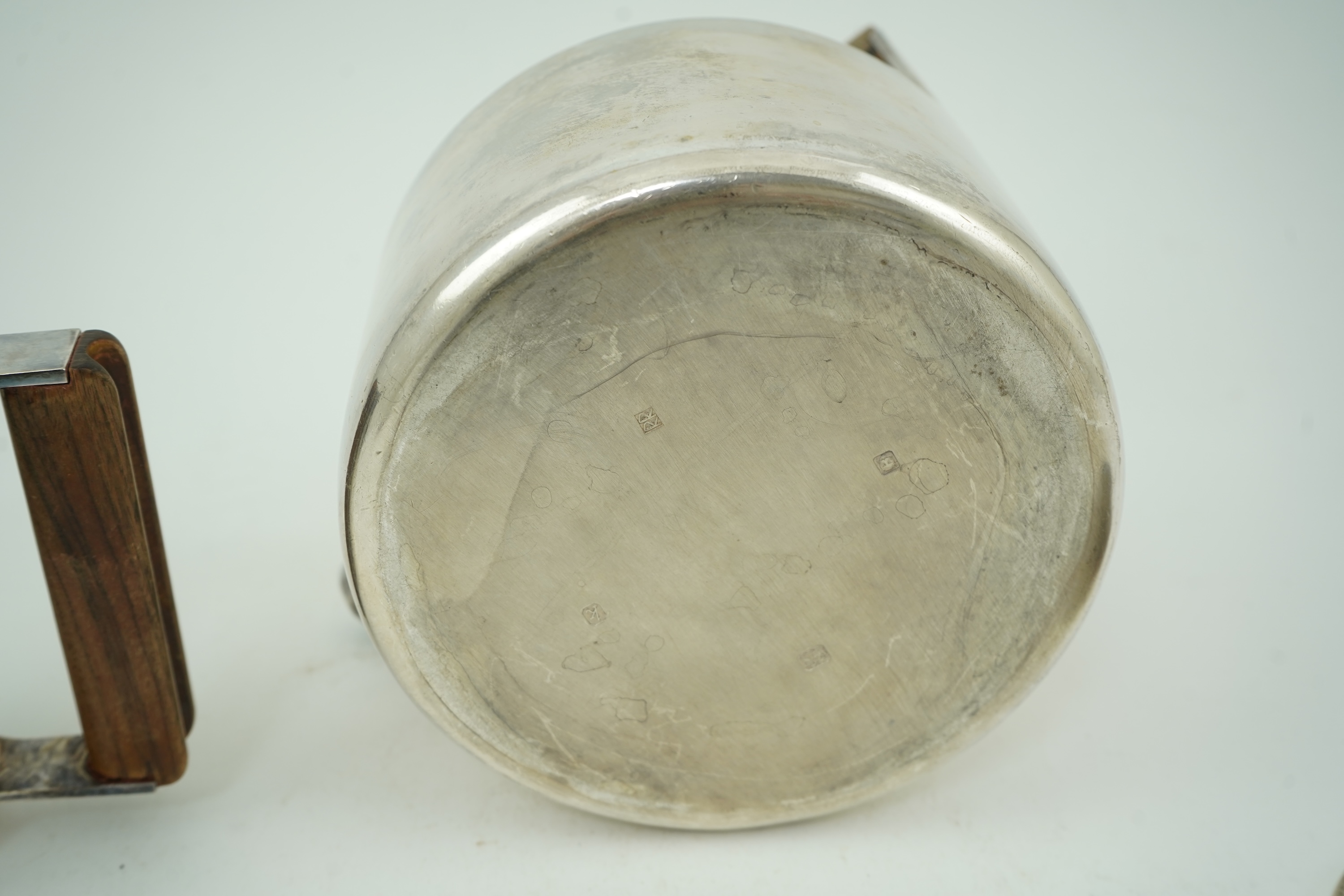 Roy Ridsdale (1942-2020): A silver tea kettle and matching cream jug